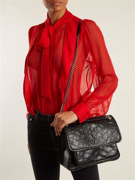 niki quilted leather zip pouch ysl|st laurent niki medium bag.